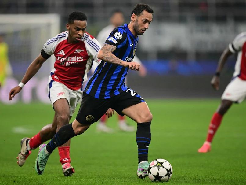 Hakan Calhanoglu Leads Inter Milan to Victorious Champions League Match Against Frustrated Arsenal