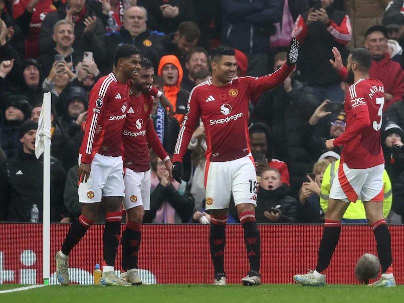 Manchester United Triumph Over Ruud Van Nistelrooy's Interim Reign; Ipswich Stun Tottenham